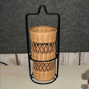 Wicker and metal holder. Use for flowers or battery operated candles.